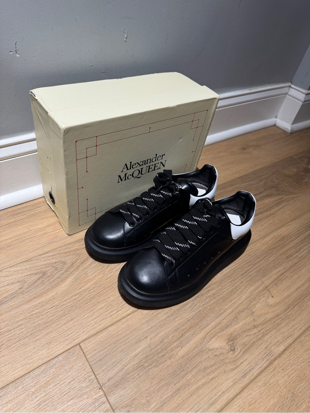 Alexander McQueen Black Leather Sneakers with White Heel Tab